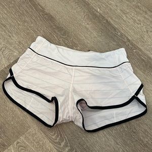 Lulu lemon light pink and gray striped Speed Up low rise shorts